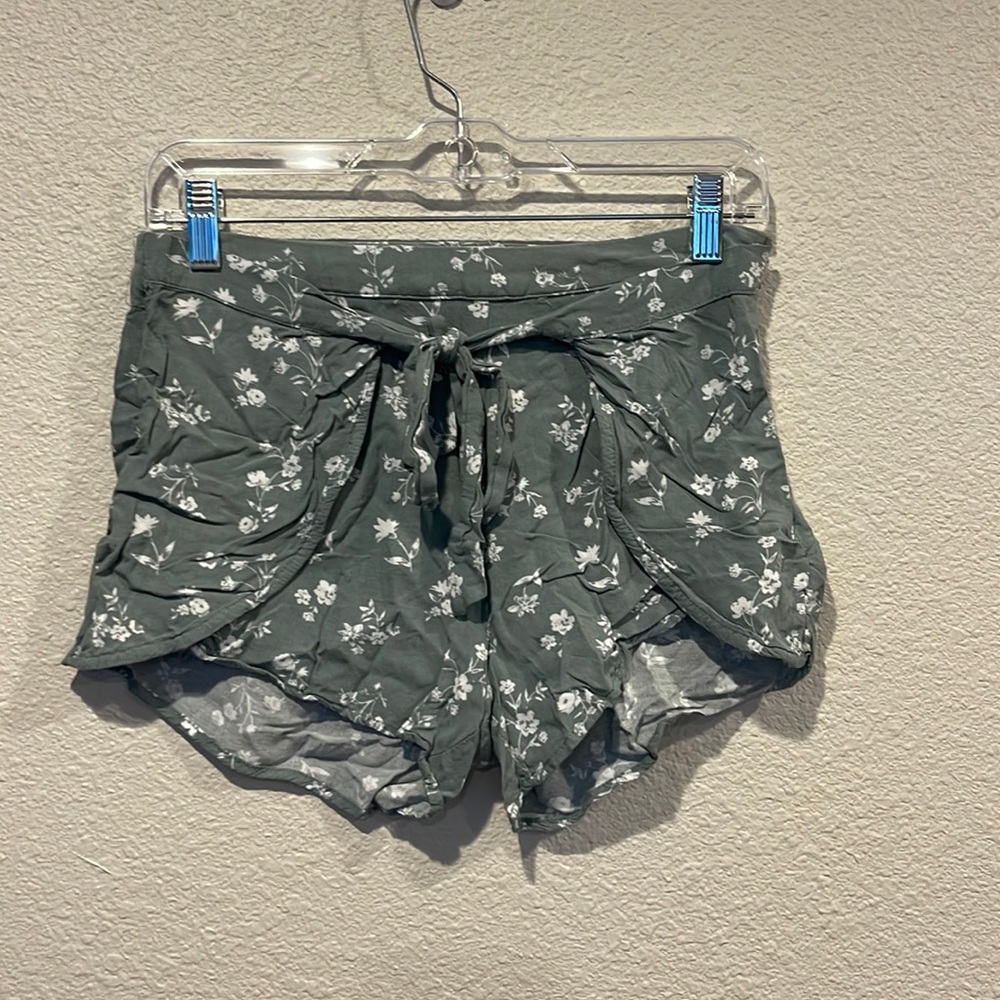 Green floral pattern shorts